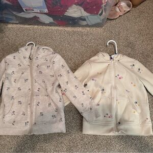 Set of zip up hoodies